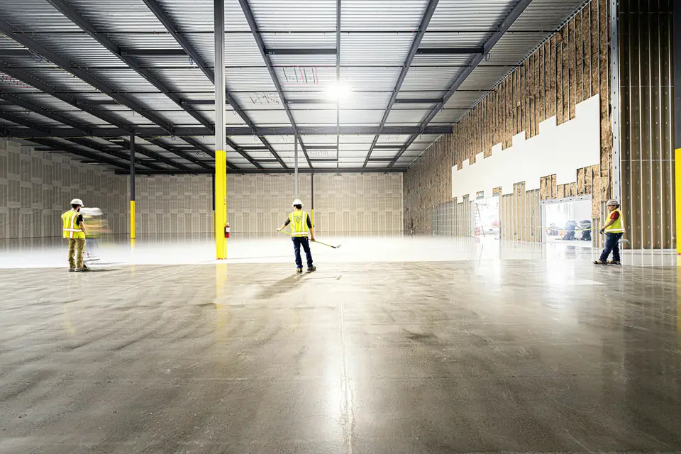 Bare, uncoated concrete slab before any epoxy floor coating is applied (stock photo)